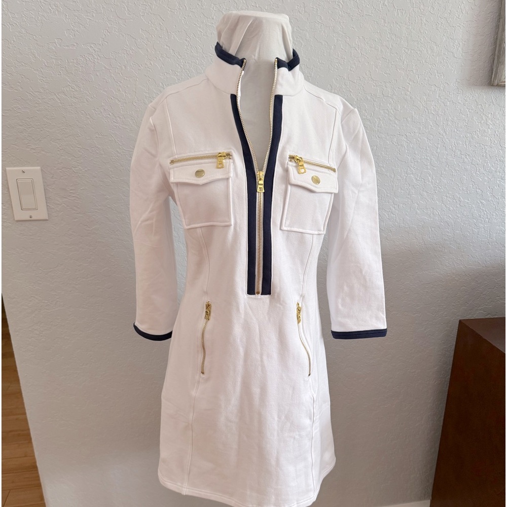 Long sleeved white dress with navy trim